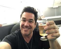 Dean Cain consuming alcohol
